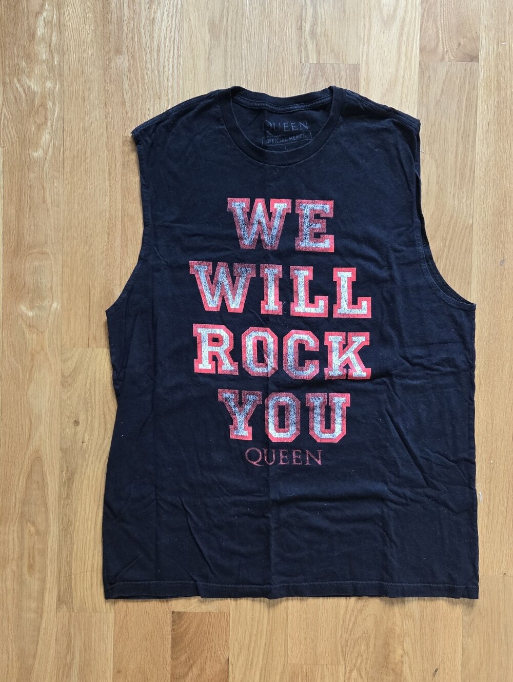 Queen Black Sleeveless Tee with Red and  White 'WE WILL ROCK YOU' Text